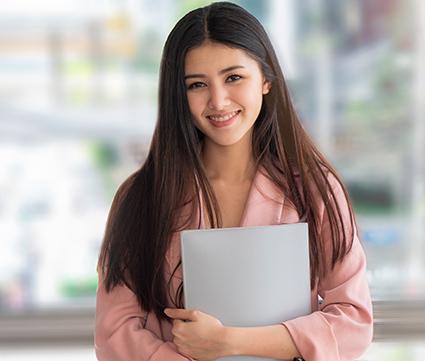Young woman reviewing documents